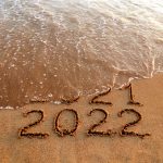 new-year-2022-and-2021-on-sandy-beach-with-waves-picture-id1340232108.jpg